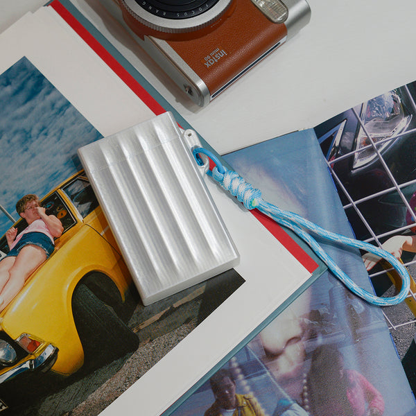 Fujifilm instax mini photo paper box, with non-stick compartments, available for release